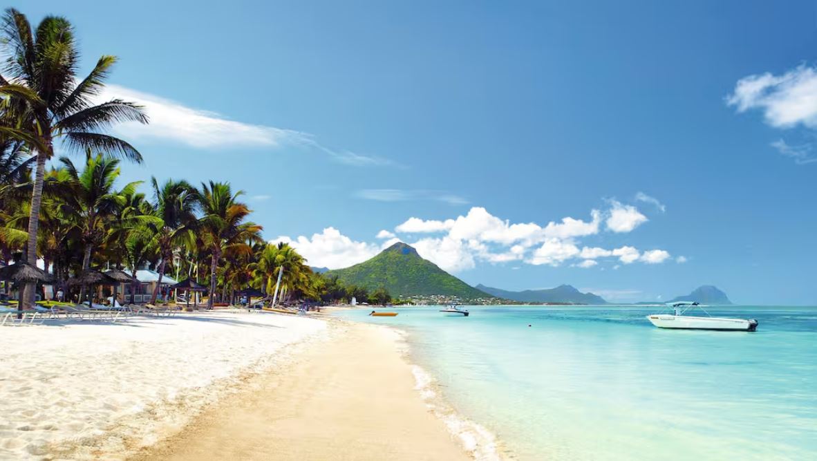 Mauritius - Flic en Flac Beach, stunning coastline with crystal-clear waters and soft white sand, perfect for a tropical getaway.