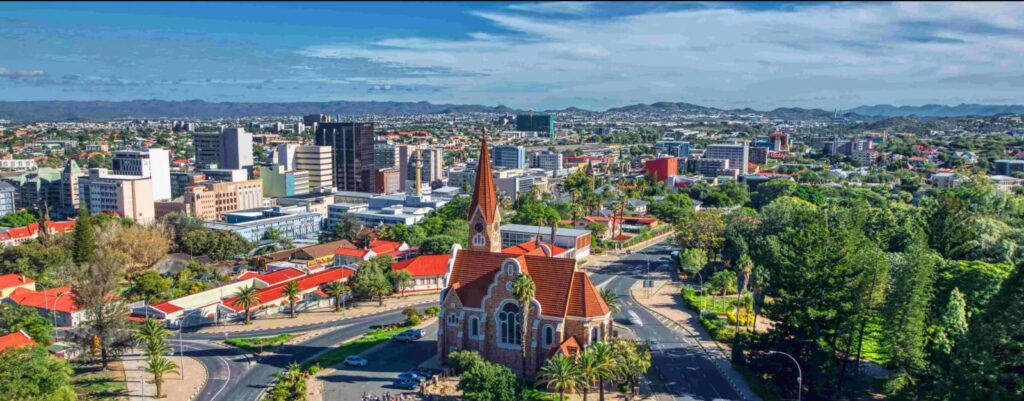 Windhoek, Namibia: A breathtaking aerial view showcasing a prominent church surrounded by the vibrant cityscape of Windhoek.