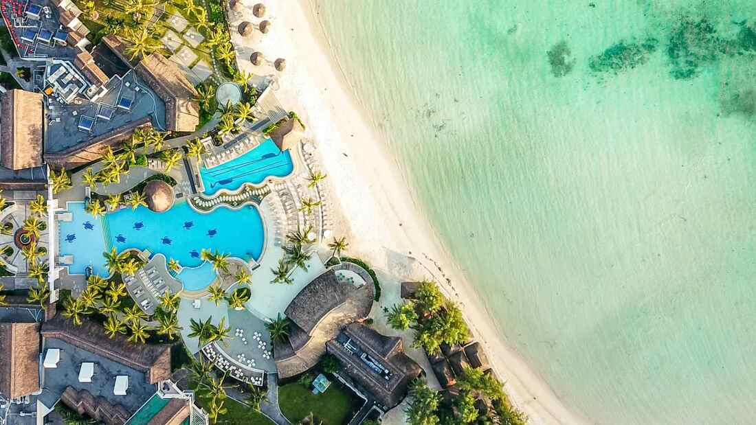 aerial view of a stunning resort and beach in Mauritius