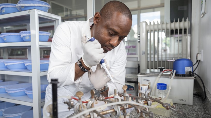 Scientist testing or creating a vaccine against malaria.