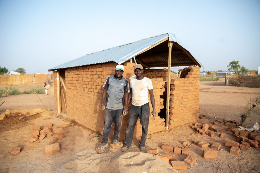 Volunteers Rebuilding their homes with the support of Shelterbox