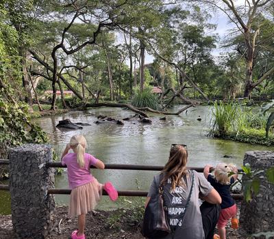 2 young girls looking over the lake at Mount Meru