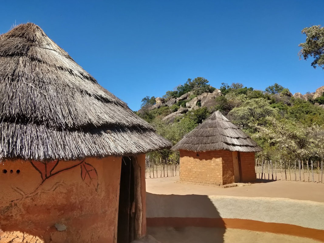 Matobo places to visit - traditional straw roofed huts.