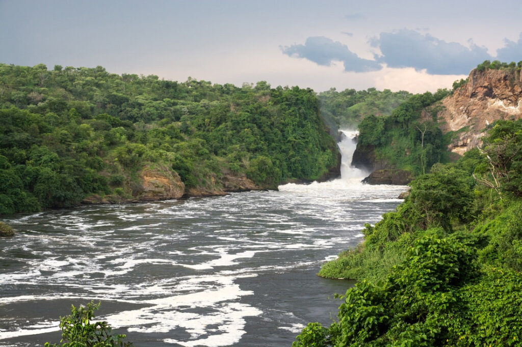 Uganda, Safari, Pearl of Africa. Showing a waterfall and river in the jungle.