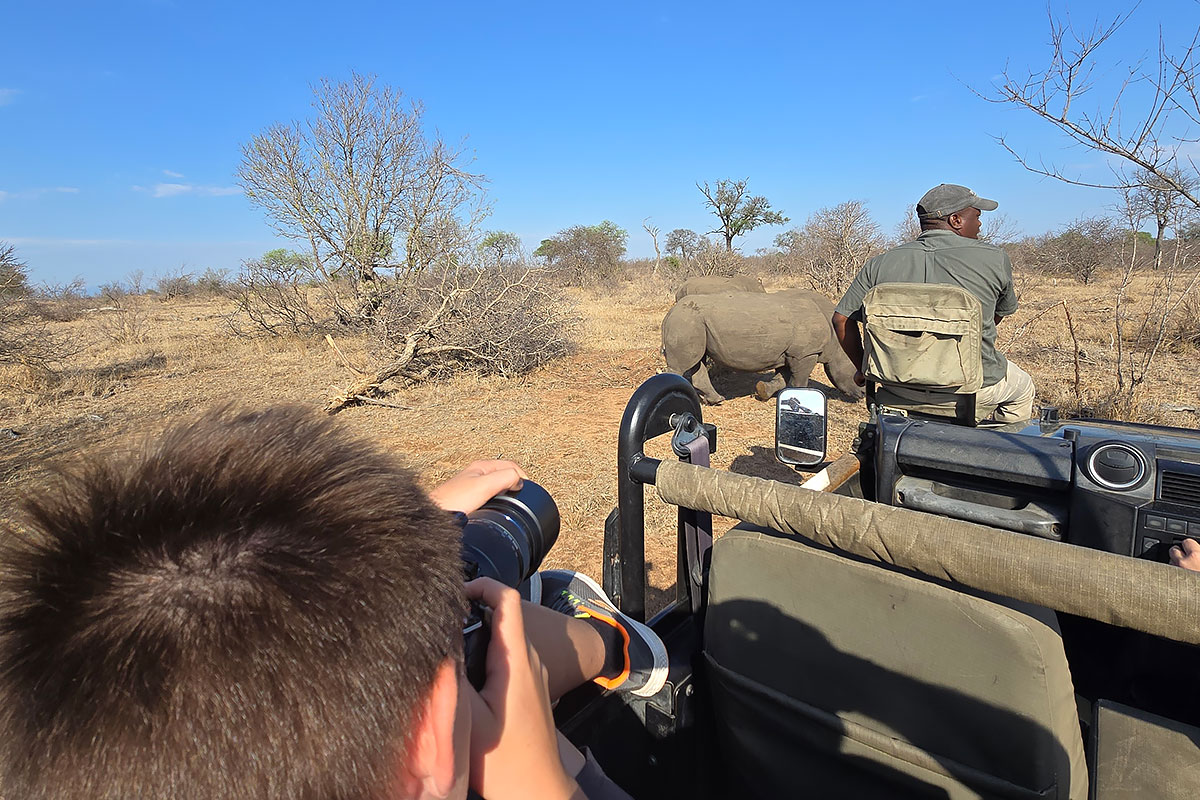Finn with Rhino and Safari Vehicle in Waterberg Game Reserves